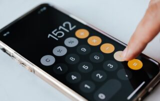 person using calculator