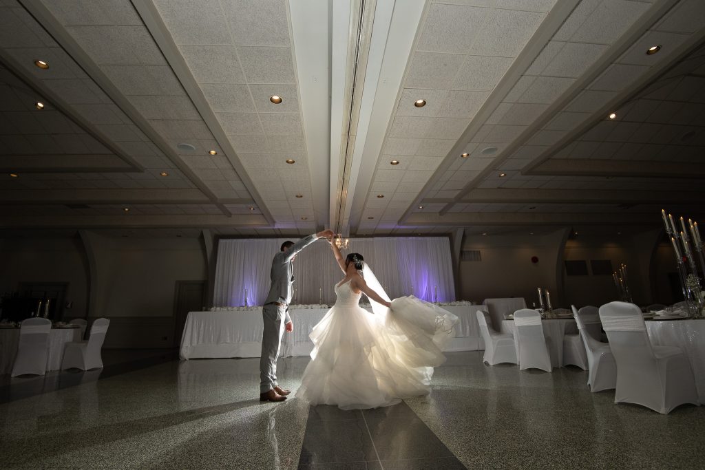 bride and groom dancing at a small wedding